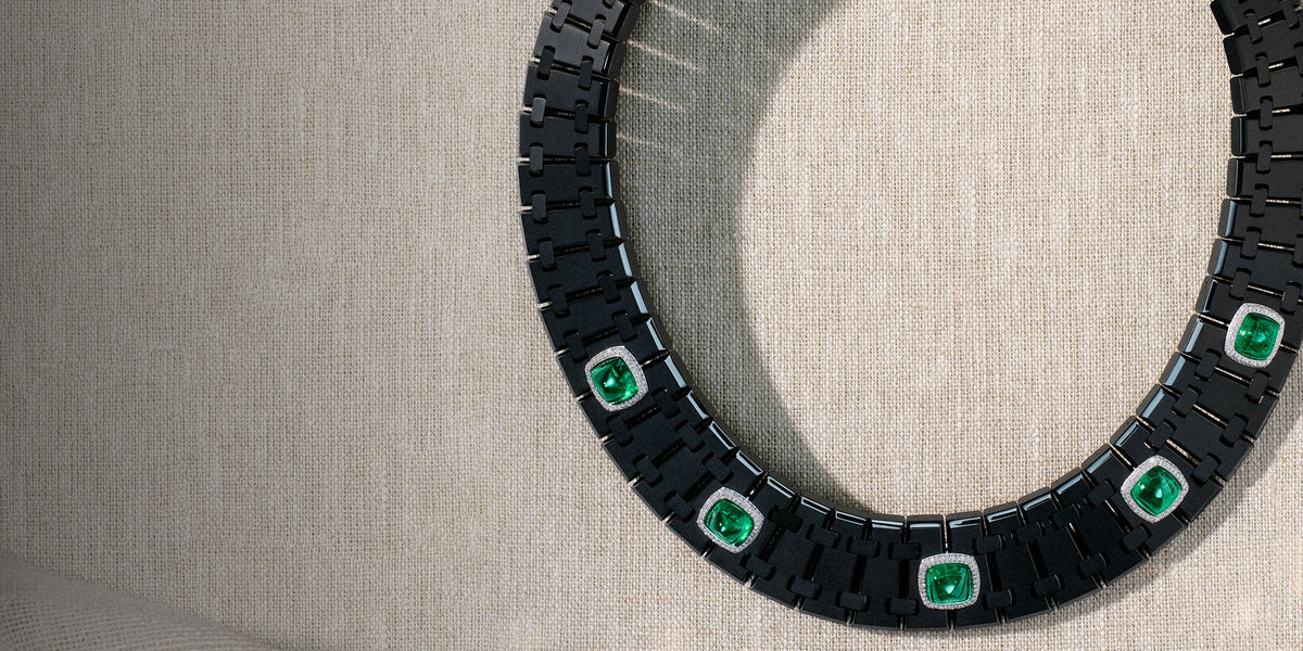 Reluxe Atelier — geometric forms and emerald accents